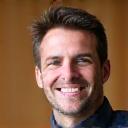 A smiling portrait of Mark T., an impressed client.
